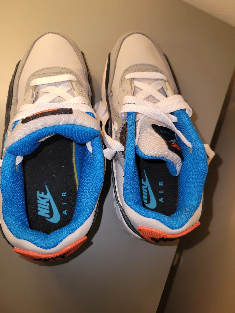 Nike AirMax90 Kids White and Gray Sneakers with Blue and Orange Accents